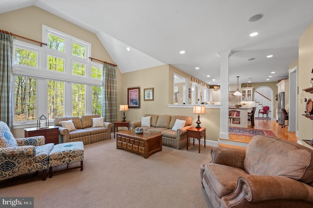 4064 Howell Rd, Malvern, PA 19355 - living area with ornate columns, recessed lighting, vaulted ceiling, and light carpet