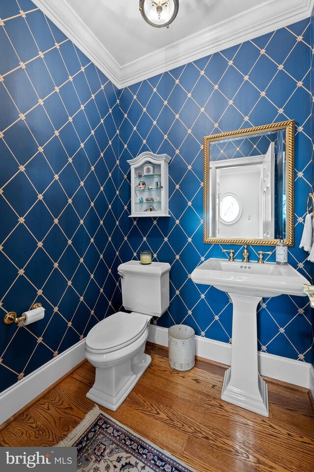 4064 Howell Rd, Malvern, PA 19355 - half bathroom featuring wood-type flooring, crown molding, and toilet