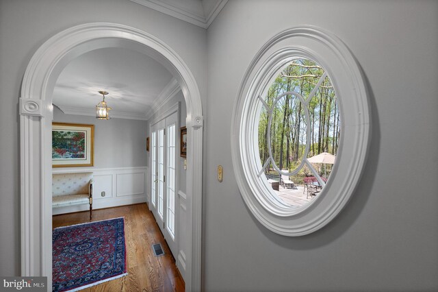 4064 Howell Rd, Malvern, PA 19355 - foyer with crown molding, arched walkways, visible vents, and plenty of natural light