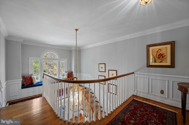 4064 Howell Rd, Malvern, PA 19355 - hall featuring a decorative wall, wood finished floors, and an upstairs landing