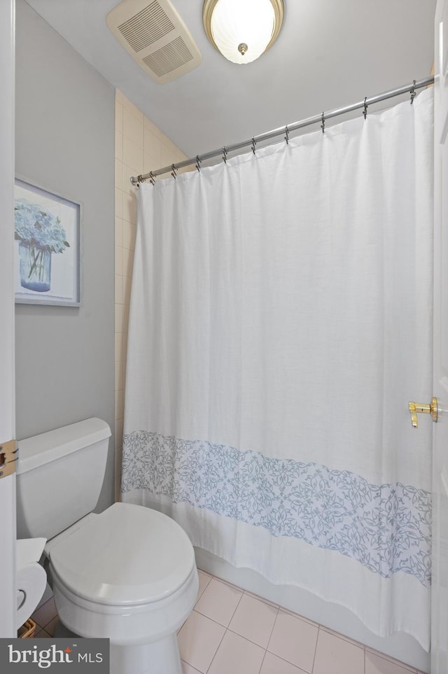 4064 Howell Rd, Malvern, PA 19355 - full bath featuring visible vents, a shower with shower curtain, tile patterned flooring, and toilet