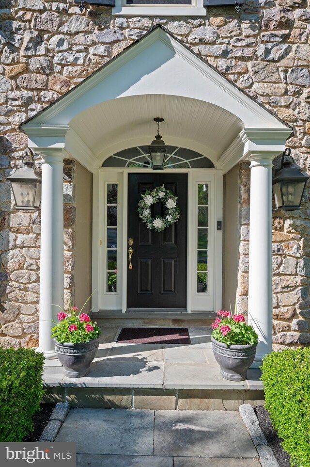 4064 Howell Rd, Malvern, PA 19355 - property entrance with a porch and stone siding
