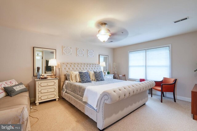 8733 Boulder Ridge Rd, Laurel, MD 20723 - bedroom featuring light carpet, baseboards, and a ceiling fan