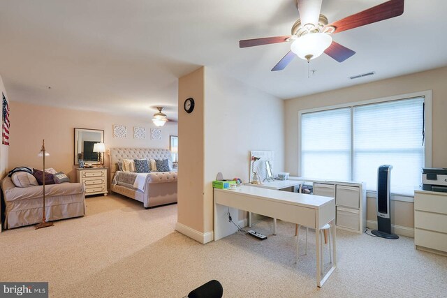 8733 Boulder Ridge Rd, Laurel, MD 20723 - home office with light carpet, ceiling fan, and baseboards