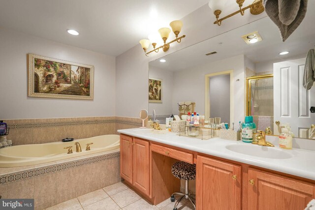 8733 Boulder Ridge Rd, Laurel, MD 20723 - bathroom featuring tile patterned floors, a stall shower, a garden tub, double vanity, and recessed lighting