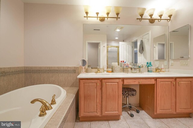 8733 Boulder Ridge Rd, Laurel, MD 20723 - bathroom featuring a garden tub, tile patterned floors, double vanity, and a shower stall