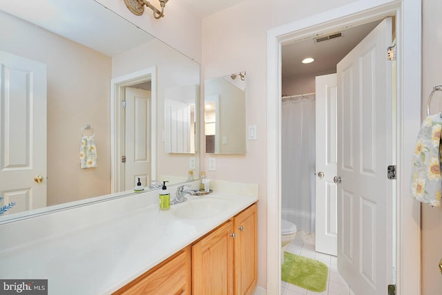 8733 Boulder Ridge Rd, Laurel, MD 20723 - full bathroom featuring tile patterned flooring, toilet, and vanity