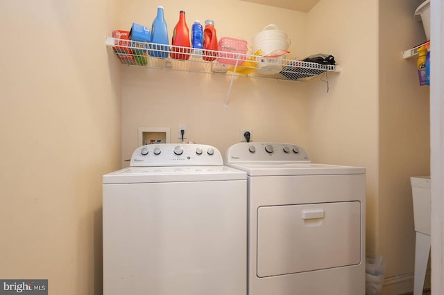 8733 Boulder Ridge Rd, Laurel, MD 20723 - clothes washing area featuring washing machine and dryer