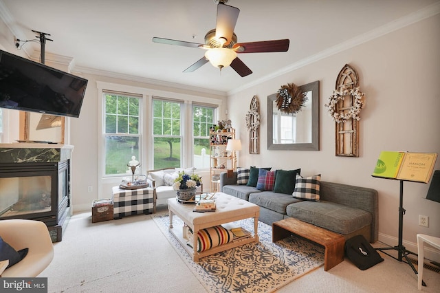 8733 Boulder Ridge Rd, Laurel, MD 20723 - carpeted living room featuring crown molding, a fireplace, ceiling fan, and baseboards