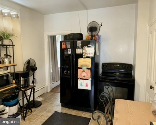 kitchen with black appliances, a baseboard radiator, and light tile patterned floors
