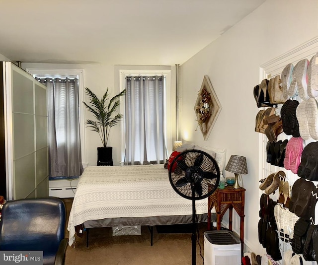 bedroom featuring a baseboard radiator