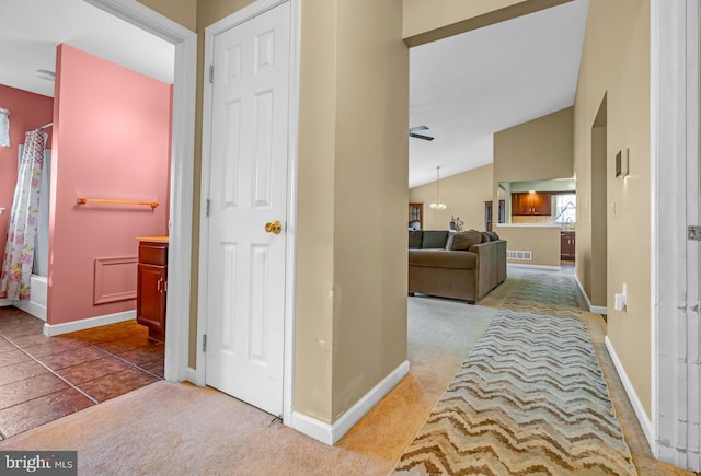 4741 Dunham Dr, Reading, PA 19606 - hallway featuring baseboards, visible vents, lofted ceiling, and carpet