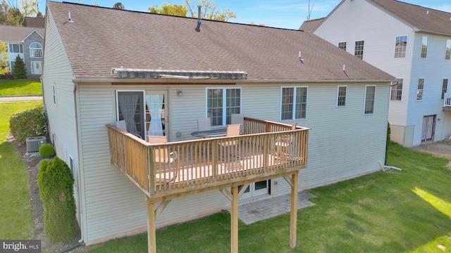 4741 Dunham Dr, Reading, PA 19606 - back of house featuring a wooden deck, a shingled roof, a yard, and central AC