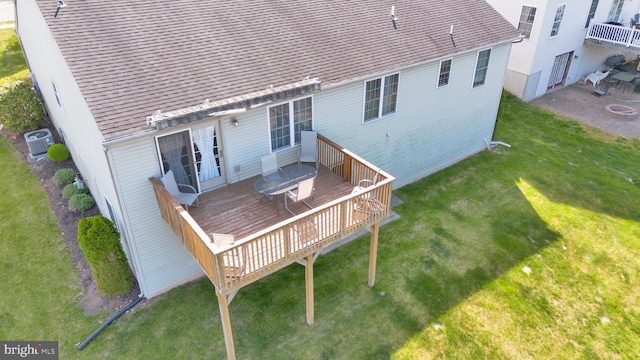 4741 Dunham Dr, Reading, PA 19606 - back of house featuring a lawn, roof with shingles, a deck, and cooling unit