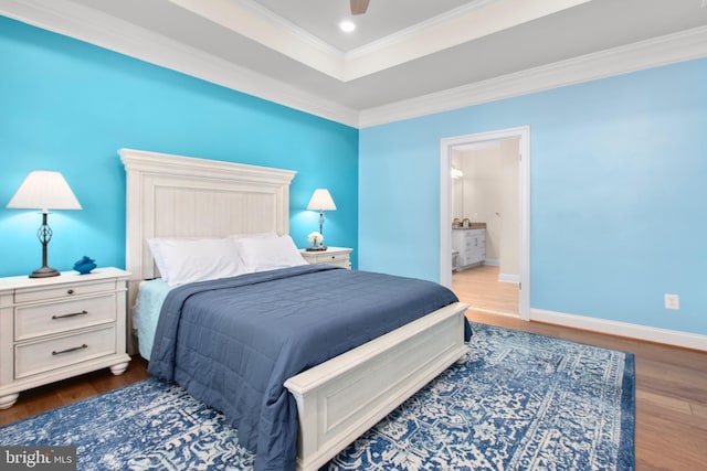 bedroom with baseboards, ornamental molding, dark wood-style floors, and recessed lighting