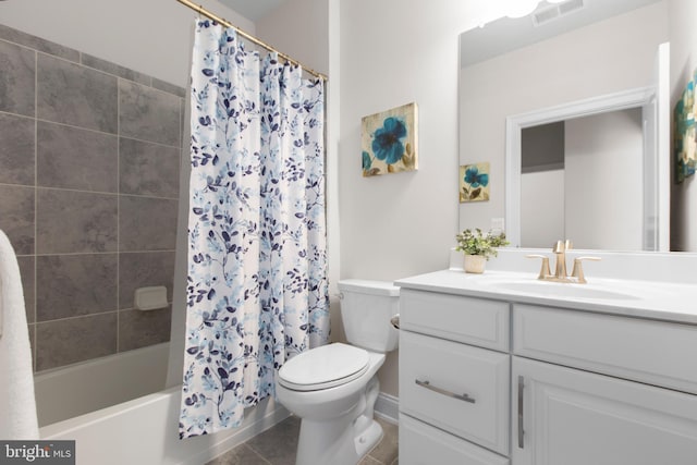 bathroom featuring shower / bath combo, vanity, toilet, tile patterned floors, and visible vents