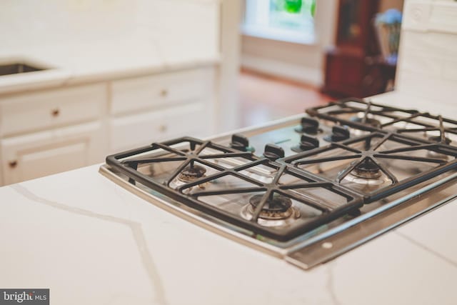 kitchen view of stainless steel gas cooktop