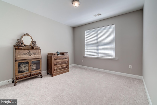 carpeted bedroom with baseboards