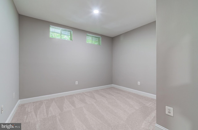 unfurnished room featuring carpet, baseboards, and recessed lighting