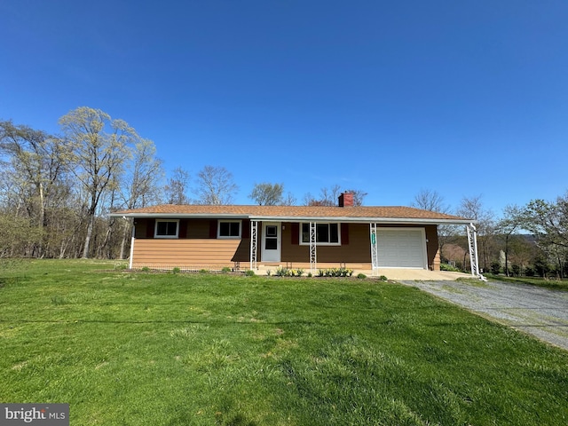single story home with driveway, a chimney, a front yard, an attached garage, and a porch
