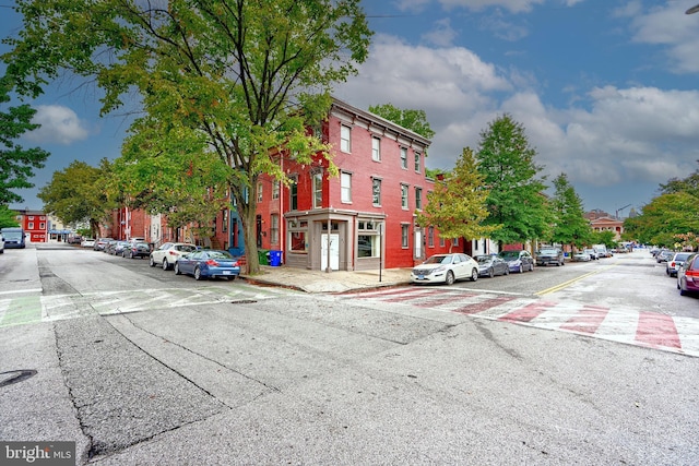 view of road featuring sidewalks and curbs