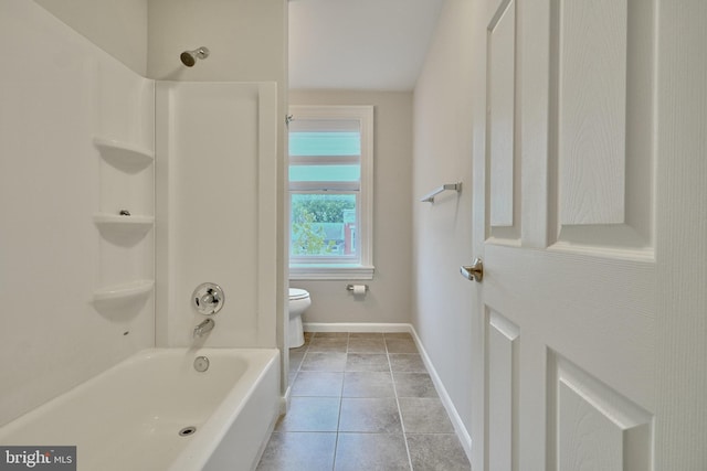 full bathroom with tile patterned floors, baseboards, toilet, and shower / tub combination