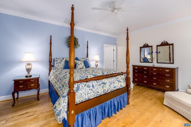 bedroom with crown molding, ceiling fan, baseboards, and light wood-style flooring