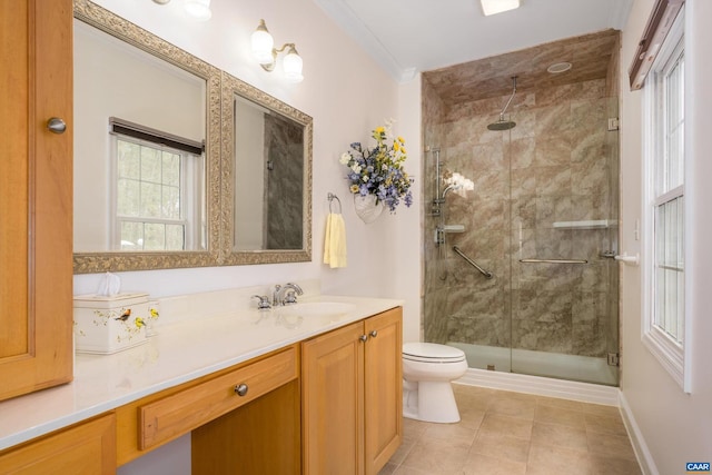 full bath with toilet, tile patterned floors, a shower stall, and vanity