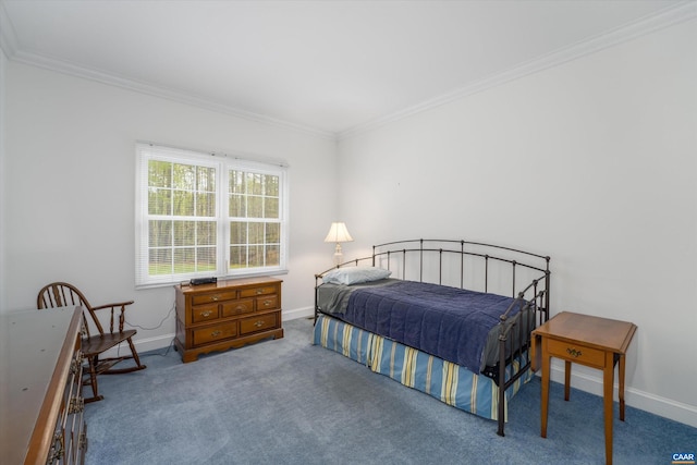 carpeted bedroom featuring baseboards and ornamental molding