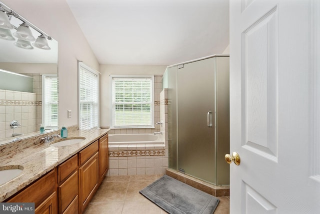 168 Sequester Dr, Stafford, VA 22556 - full bath with a stall shower, a garden tub, tile patterned floors, double vanity, and vaulted ceiling