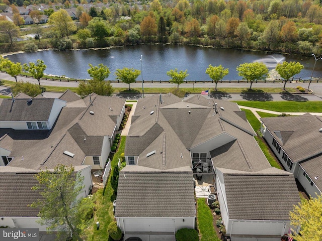 aerial view with a water view and a residential view