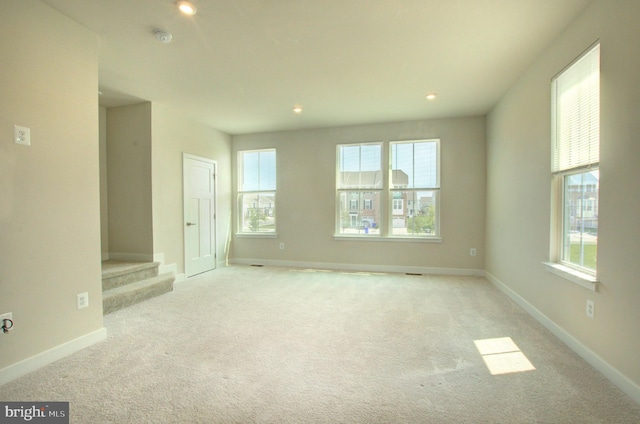 110 Fletcher Cir, Middletown, DE 19709 - carpeted empty room featuring healthy amount of natural light, a smoke detector, baseboards, and recessed lighting
