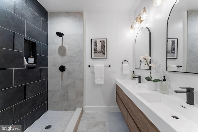 143 13th St NE, Washington, DC 20002 - full bathroom featuring baseboards, double vanity, tiled shower, and tile patterned flooring