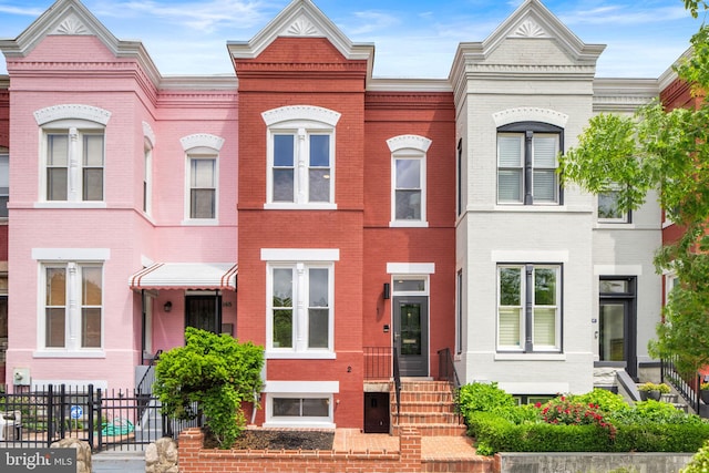143 13th St NE, Washington, DC 20002 - view of property with brick siding and fence