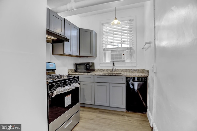101 W 39th St Unit 101, Baltimore, MD 21210 - kitchen featuring gray cabinetry, ventilation hood, black appliances, and a sink