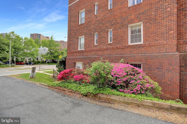 101 W 39th St Unit 101, Baltimore, MD 21210 - view of property exterior with brick siding