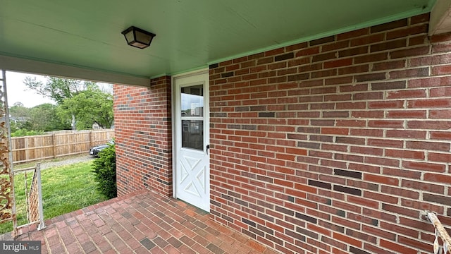 view of patio with fence