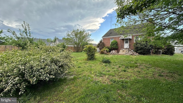 view of yard with fence