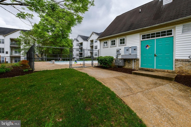 view of yard featuring a gate and fence