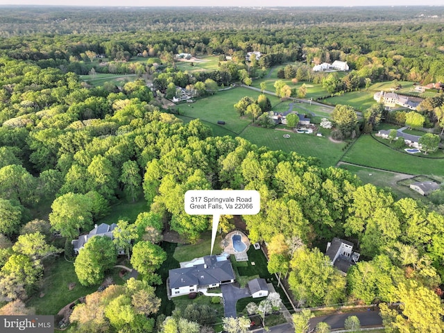 317 Springvale Rd, Great Falls, VA 22066 - aerial view of property and surrounding area with a heavily wooded area