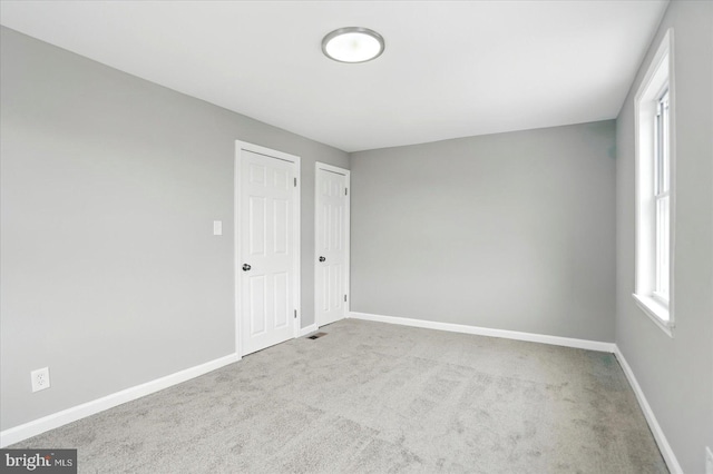 1212 Primrose Ave, Baltimore, MD 21237 - unfurnished room featuring carpet flooring and baseboards