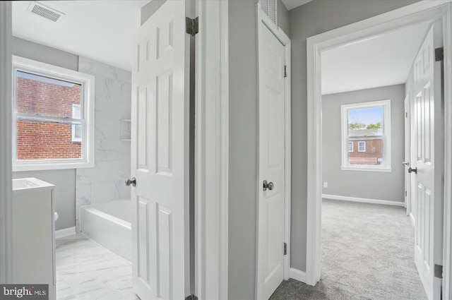 1212 Primrose Ave, Baltimore, MD 21237 - bathroom with visible vents, vanity, marble finish floor, and baseboards