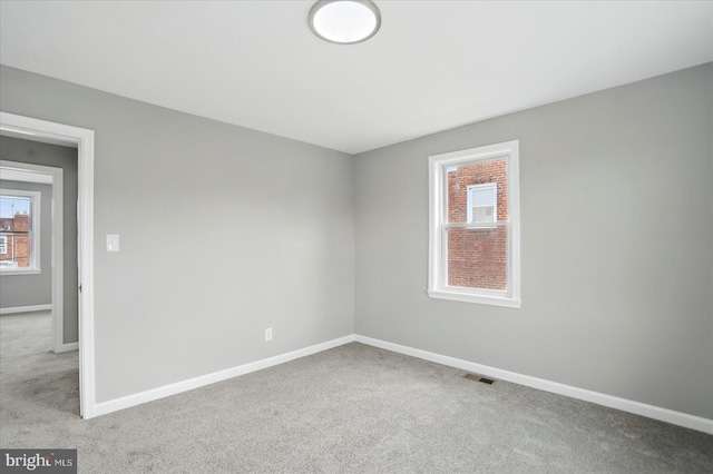1212 Primrose Ave, Baltimore, MD 21237 - unfurnished room featuring visible vents, baseboards, and carpet floors