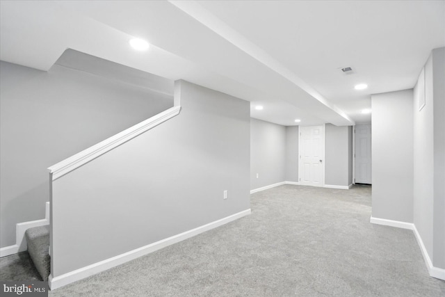 1212 Primrose Ave, Baltimore, MD 21237 - finished below grade area featuring recessed lighting, stairway, carpet floors, and baseboards
