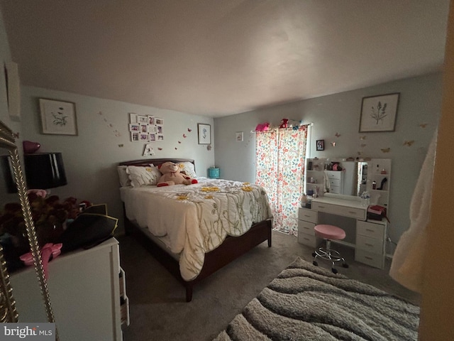 bedroom featuring carpet