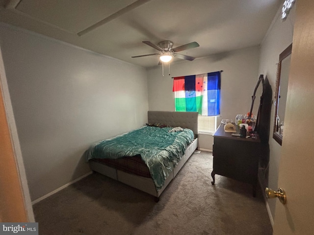 carpeted bedroom featuring ceiling fan and baseboards