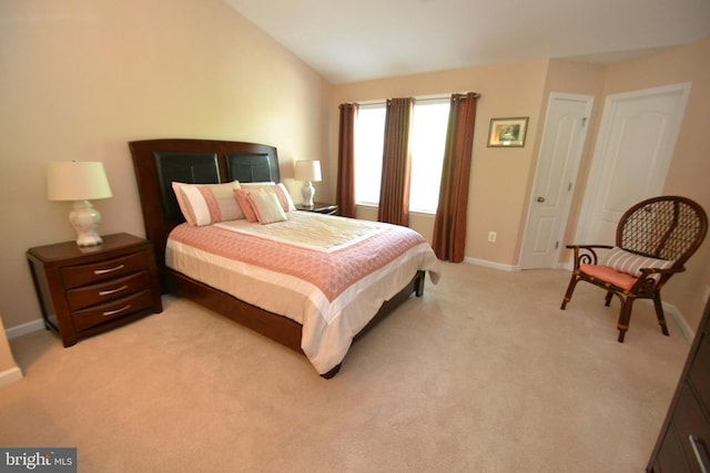 724 Hidden Oak Ln, Glen Burnie, MD 21060 - bedroom featuring baseboards, vaulted ceiling, and light carpet