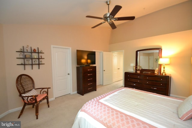 724 Hidden Oak Ln, Glen Burnie, MD 21060 - bedroom with baseboards, a ceiling fan, high vaulted ceiling, and light carpet