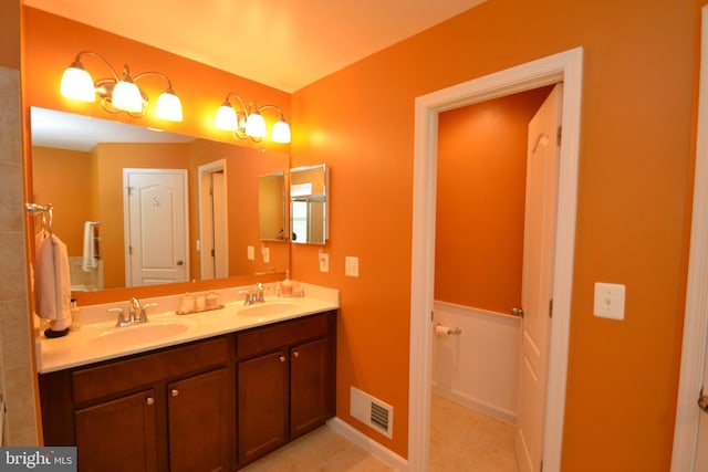 724 Hidden Oak Ln, Glen Burnie, MD 21060 - bathroom with double vanity, tile patterned floors, visible vents, and a sink