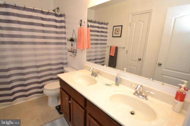 724 Hidden Oak Ln, Glen Burnie, MD 21060 - full bath with tile patterned flooring, a sink, double vanity, and toilet